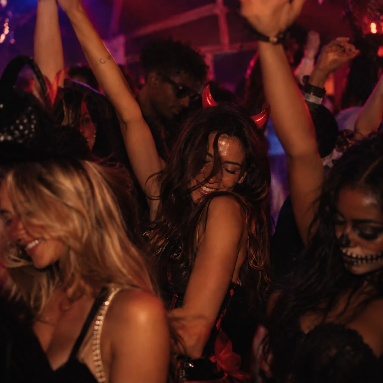 Guests in Halloween costumes dancing at Platform